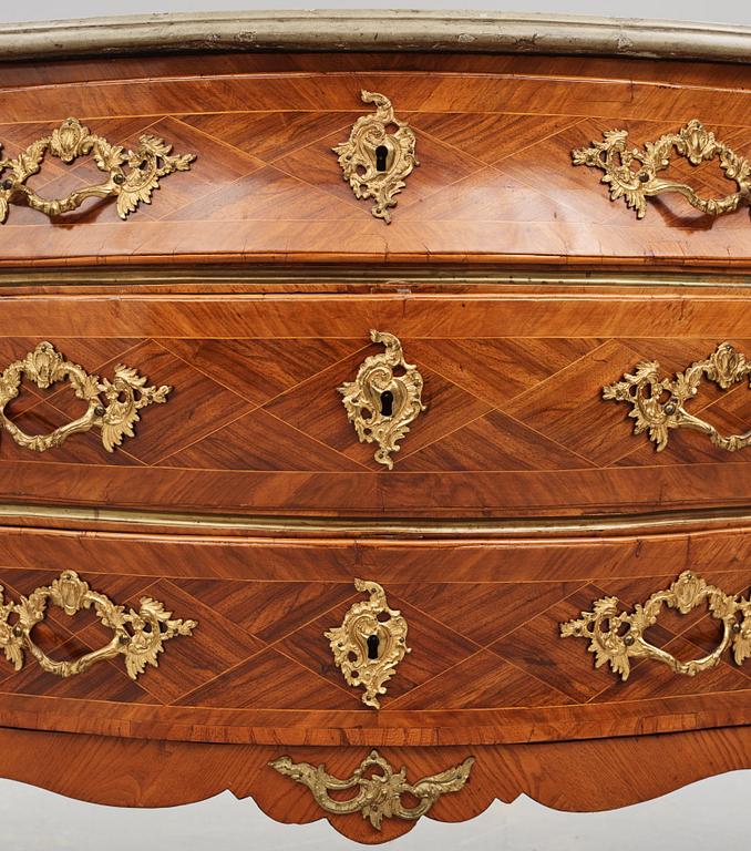 A Swedish rococo rosewood and gilt brass-mounted commode, later part of the 18th century.