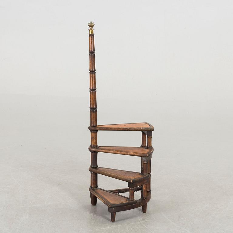 A Mahogany library ladder.