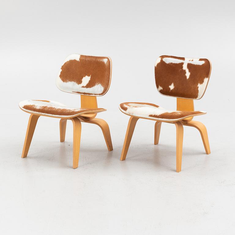 Charles & Ray Eames, a pair of 'Plywood Group DWC' chairs, Vitra.