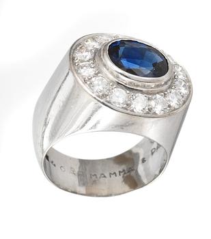 RING, set with blue sapphire, 4 cts, and brilliant cut diamonds, tot. 1.10 cts.