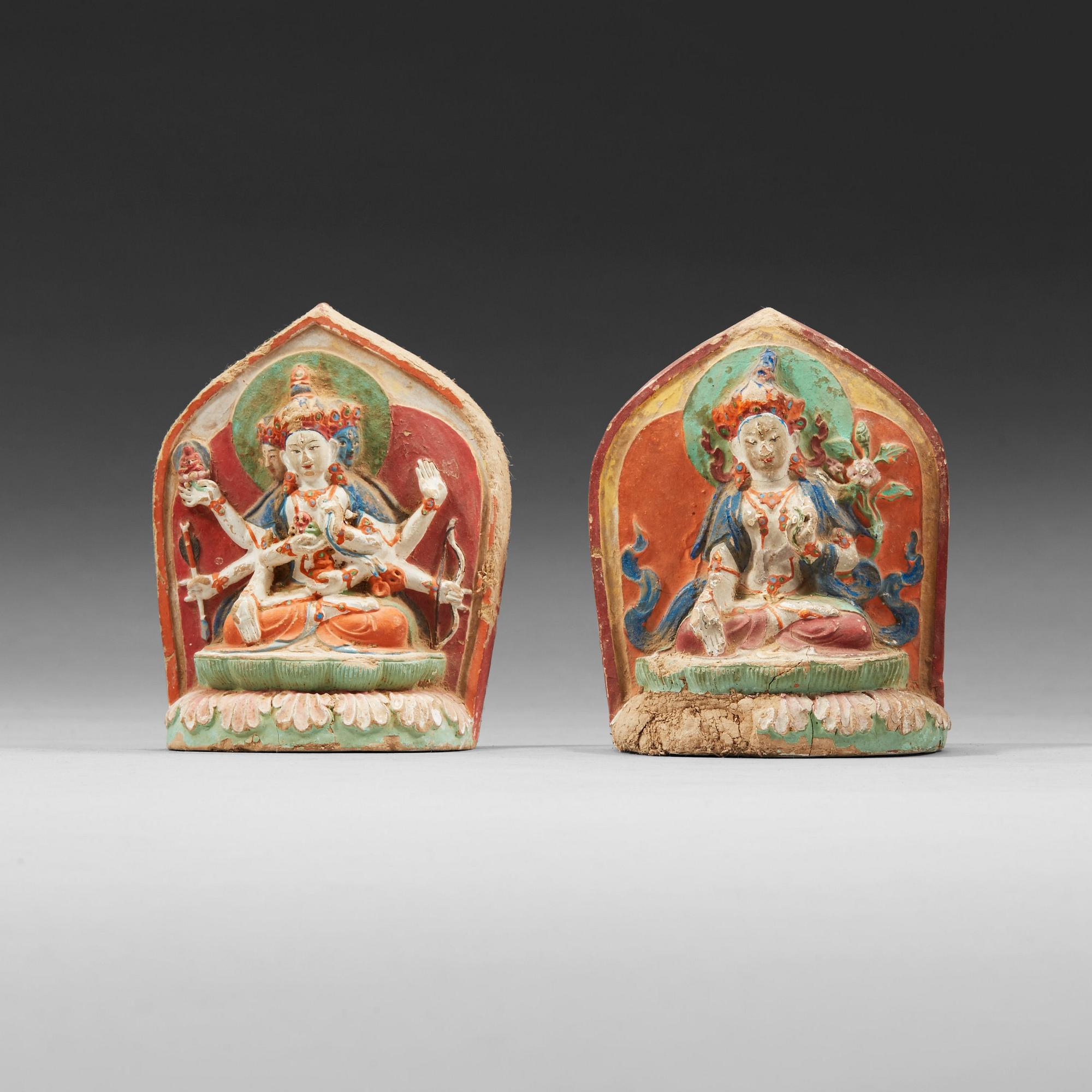 Two clay tsa-tsas, Tibet, 18/19th Century.