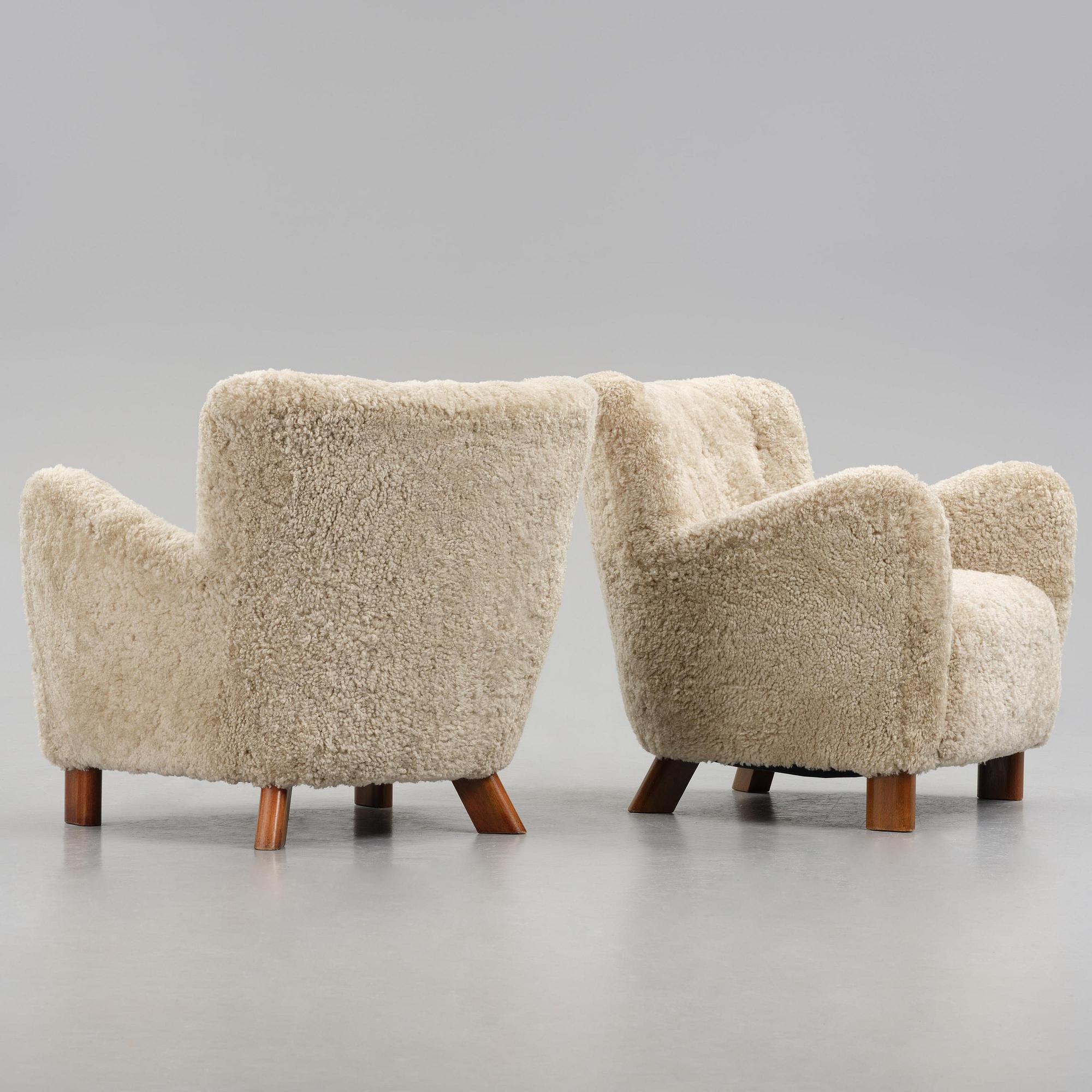 Fritz Hansen, a pair of easy chairs model "1669", Denmark, 1940s.