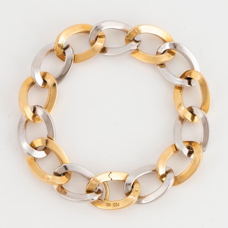 An 18K gold and white gold bracelet.