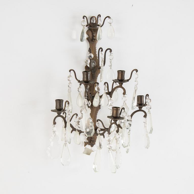 A pair of brass and cut glass five-light  baroque-style wall lights.