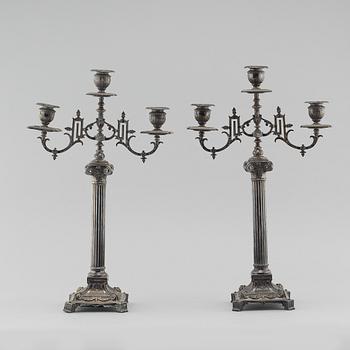 A pair of silver plated candelabras from aorund year 1900.