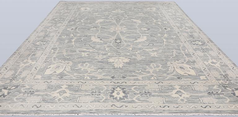 A carpet, Ziegler design, approx. 427 x 305 cm.