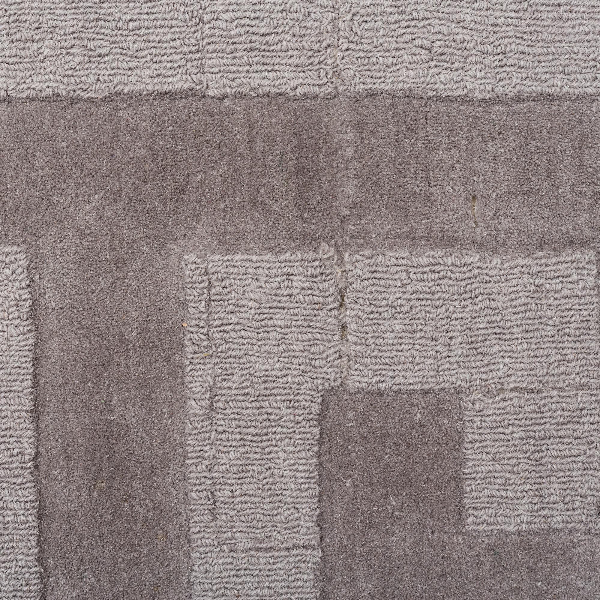 A Layered "Wool Cubes" carpet, 390x620 cm.