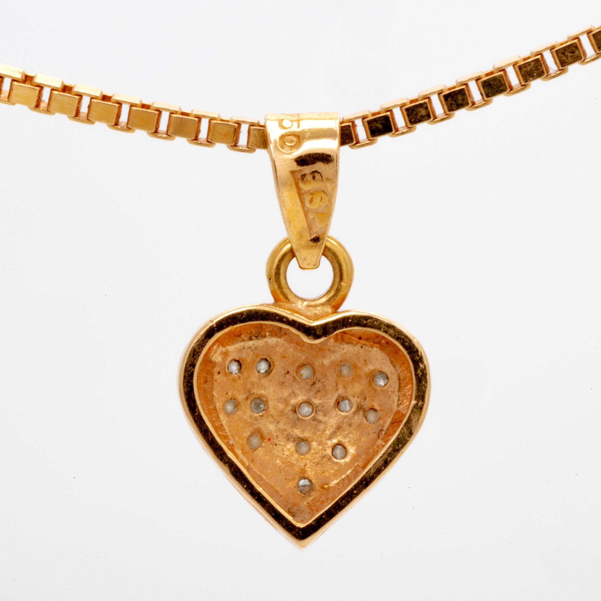 An 18K gold necklace with octagonal cut diamonds.