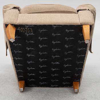 An armchair with footstool, Howard model, Englessons, 21st century.