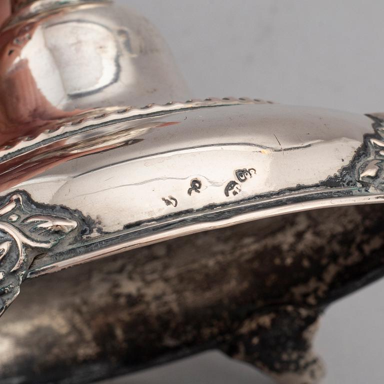 A pair of silver candlesticks, circa 1900.