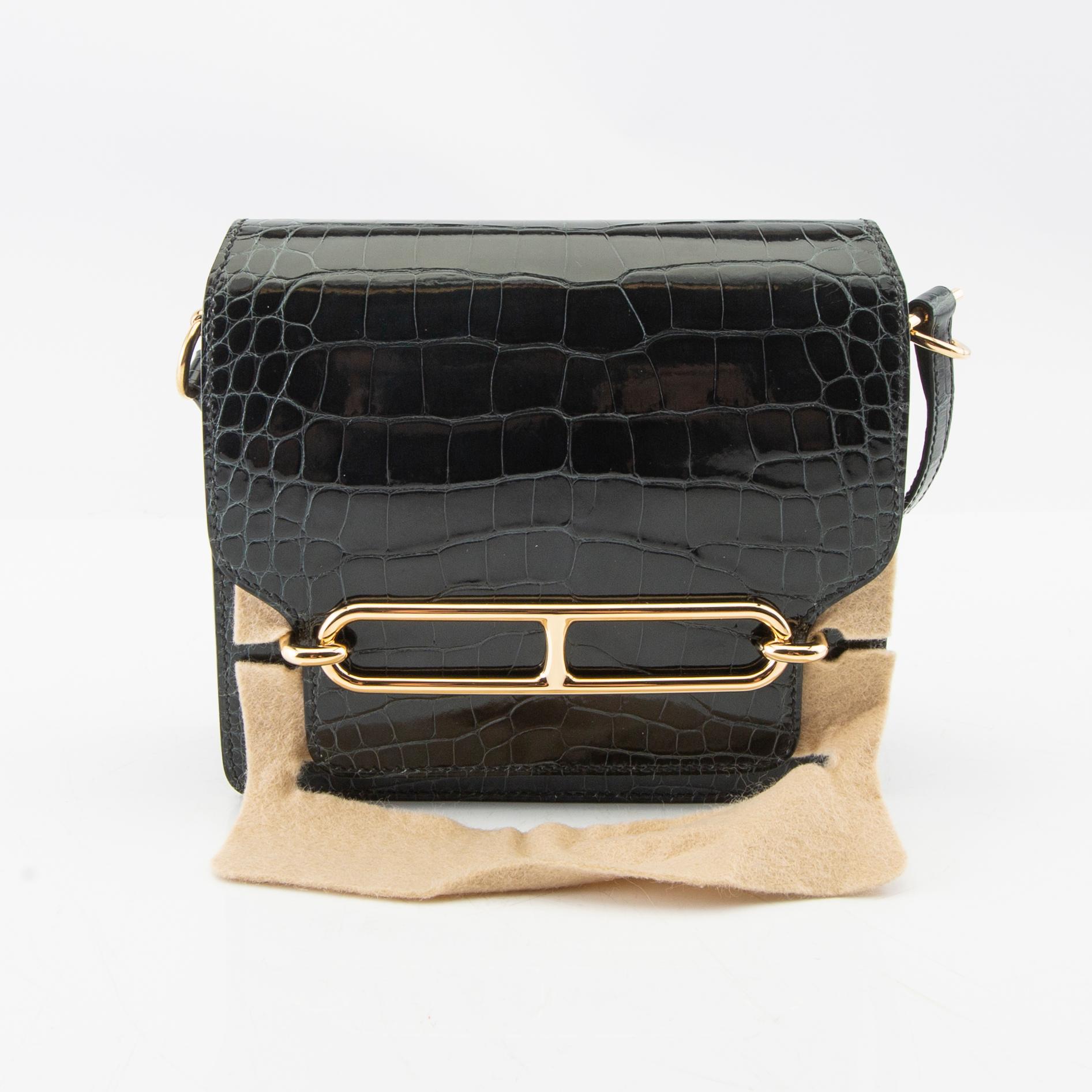 Hermès, bag "Green Shiny Alligator Mini Roulis 18 Permabrass Hardware" 2021.