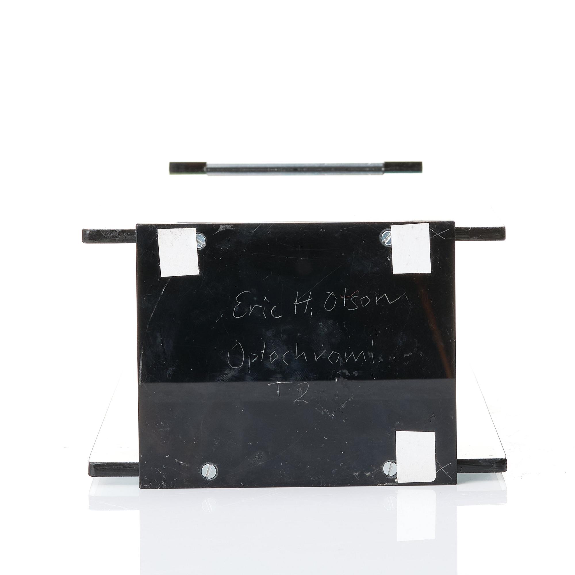 Eric H Olson, "Optochromi T2".