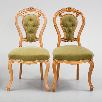 A set of seven late 1800s chairs.