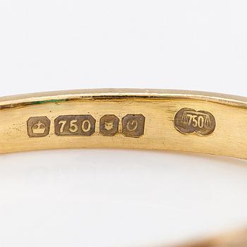 Ring, 18K guld, smaragd och diamanter ca 0.20 ct totalt. Storbritannien.