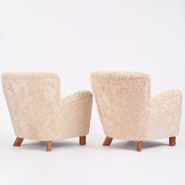 Fritz Hansen, a pair of easy chairs model '1669', Denmark 1940-50s.
