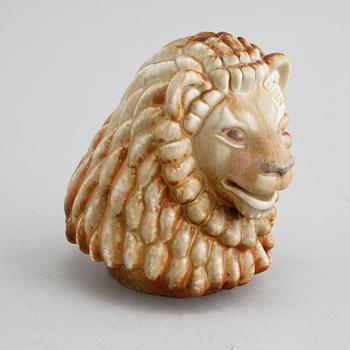 A stoneware figurine, designed by Gunnar Nylund for Rörstrand in the mid 20th century.