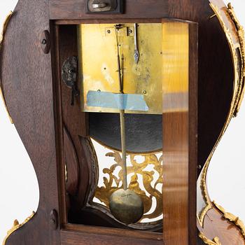 A rococo-style bracket clock, 20th century incorporating older elements.