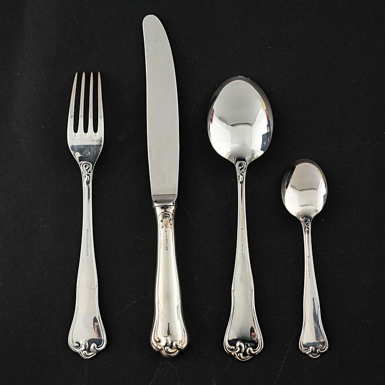 A silver set of table ware of 47 pcs by MEMA, from the late 20th century.