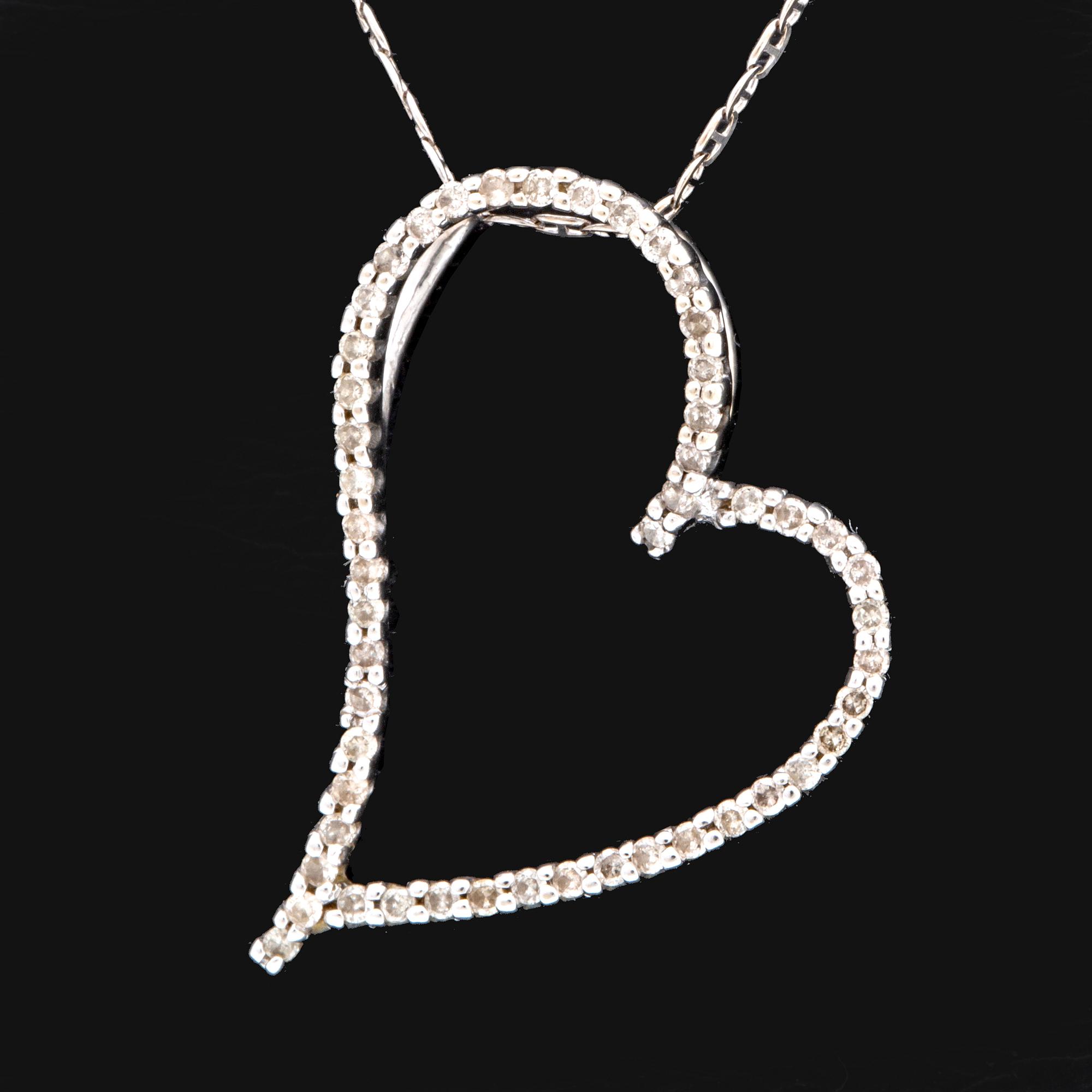 Pendant and chain, 14K whitegold brilliant-cut Diamonds, total length approx 48 cm.