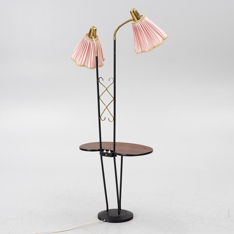 A floor lamp with table, 1940s.