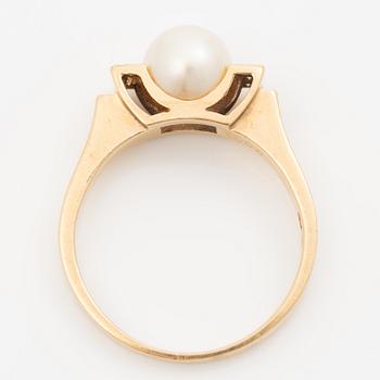 Ring, 18K gold with cultured pearl and octagonal-cut diamonds.