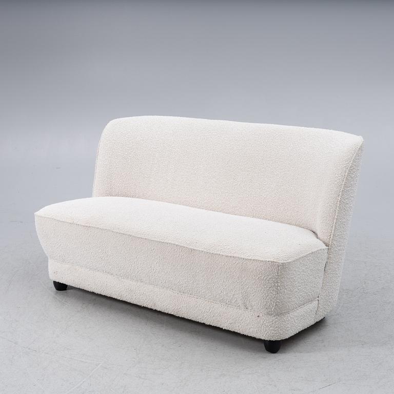 A contemporary sofa and armchair, Boom Interior.