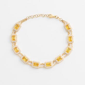Bracelet with yellow sapphires and brilliant-cut diamonds.