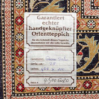 A runner, Ghom, silk. Approx. 100 x 425 cm.