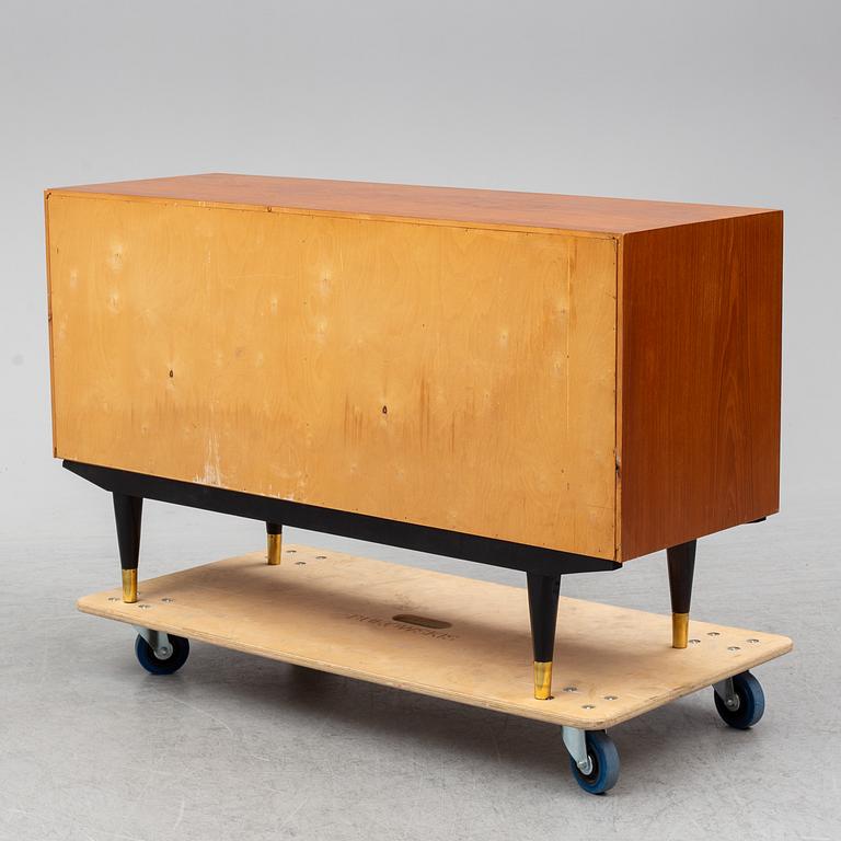 A 'London' teak veneered sideboard by IKEA.