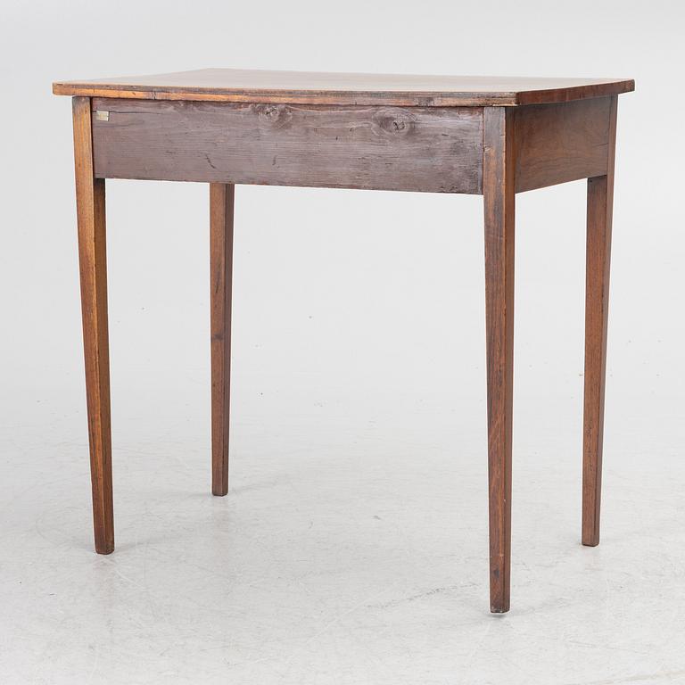 A table, England, circa 1900.