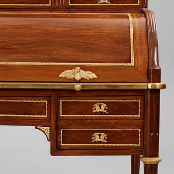 A Louis XVI-style mahogany and ormolu mounted 'bureau a cylindre', later part of the 19th century.