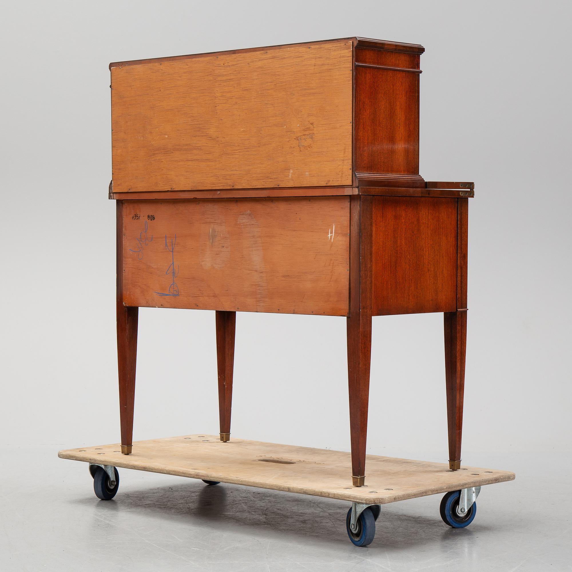 A gustavian style secretaire from the mid 20th century.