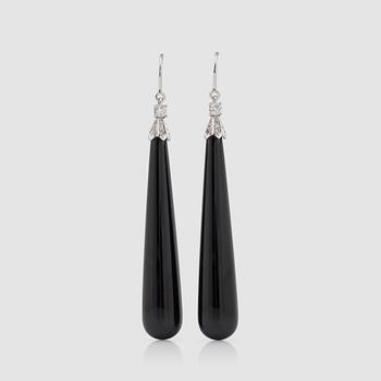 1234. A pair of onyx and brilliant-cut diamond earrings. Totral carat weight circa 0.30 ct.