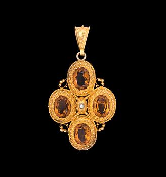 56. A citrine brooch/pendant, 1880's.