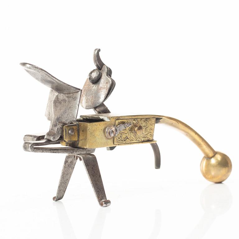 A Northern European flintlock lighter, mid 18th century.