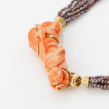 Multi-strand pearl necklace with two clasps set with carved coral, cabochon-cut tourmaline, and brilliant-cut diamonds.