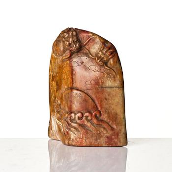 A group of carved nephrite and jade ornaments, China, Qing dynasty and older. (8 pieces).