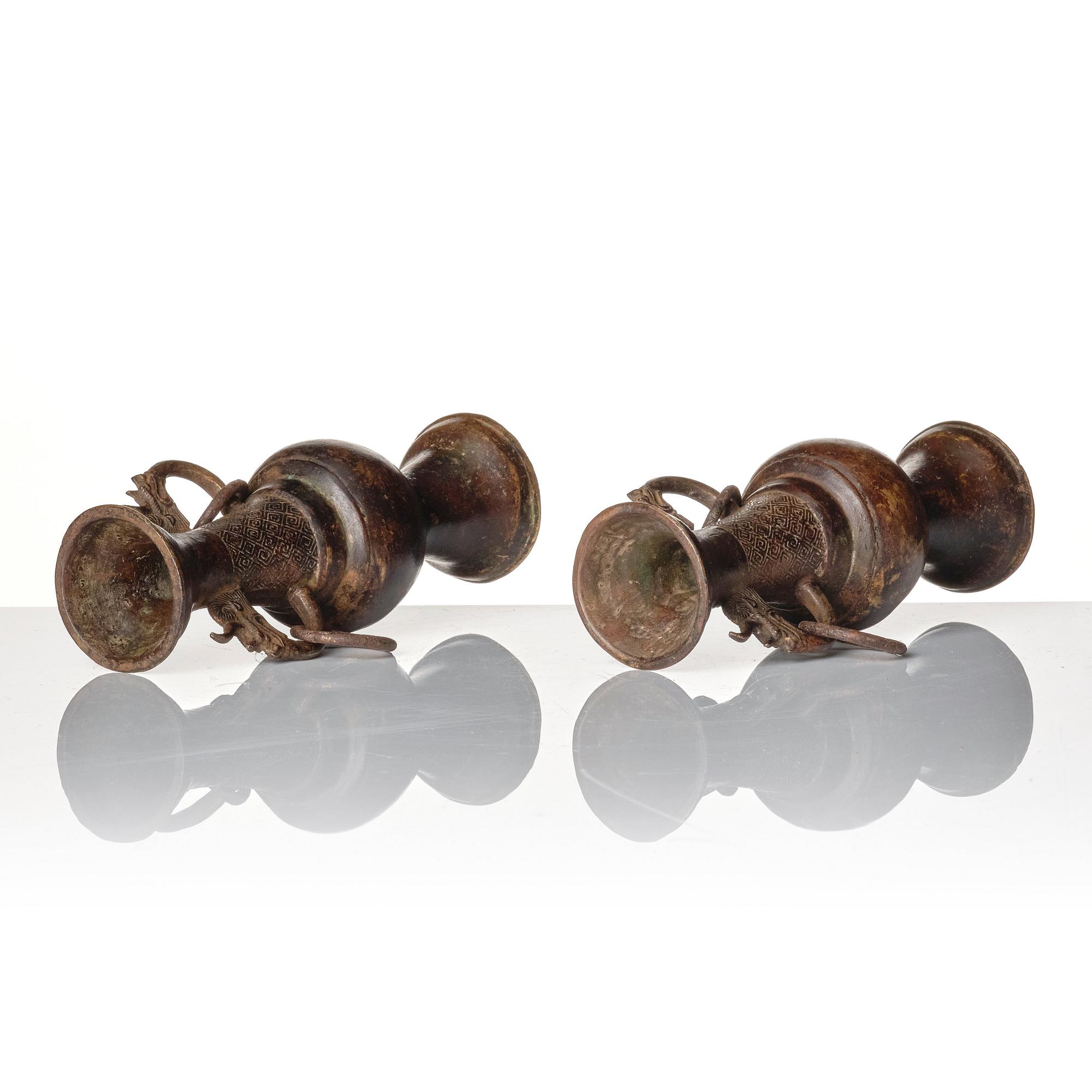 A pair of bronze altar vases, Ming dynasty (1368-1644).