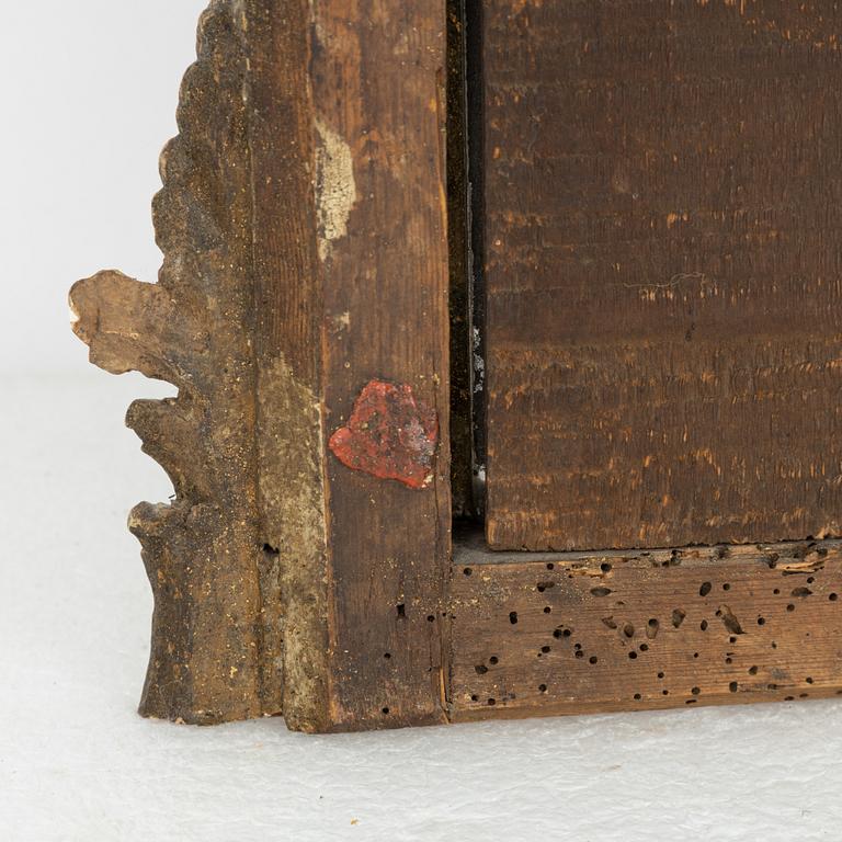 A rococo mirror, second part of the 18th Century.