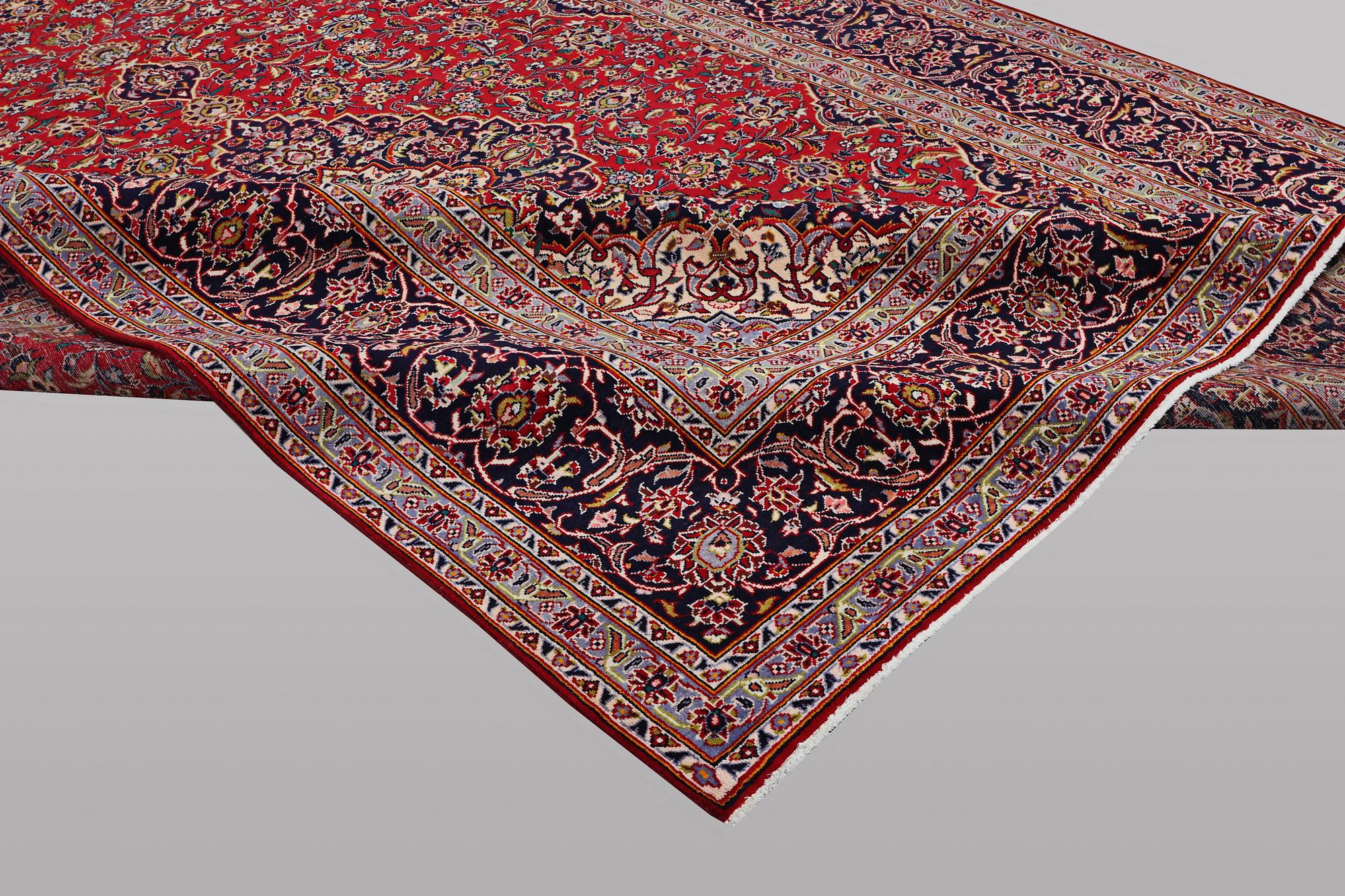 A carpet, Kashan, ca 397 x 295 cm.