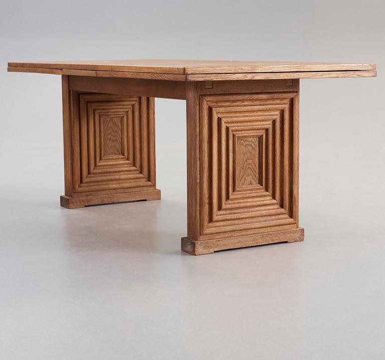 A Swedish Modern oak dining table, attributed to Oscar Nilsson, probably executed by cabinetmaker J Wickman, Stockholm,