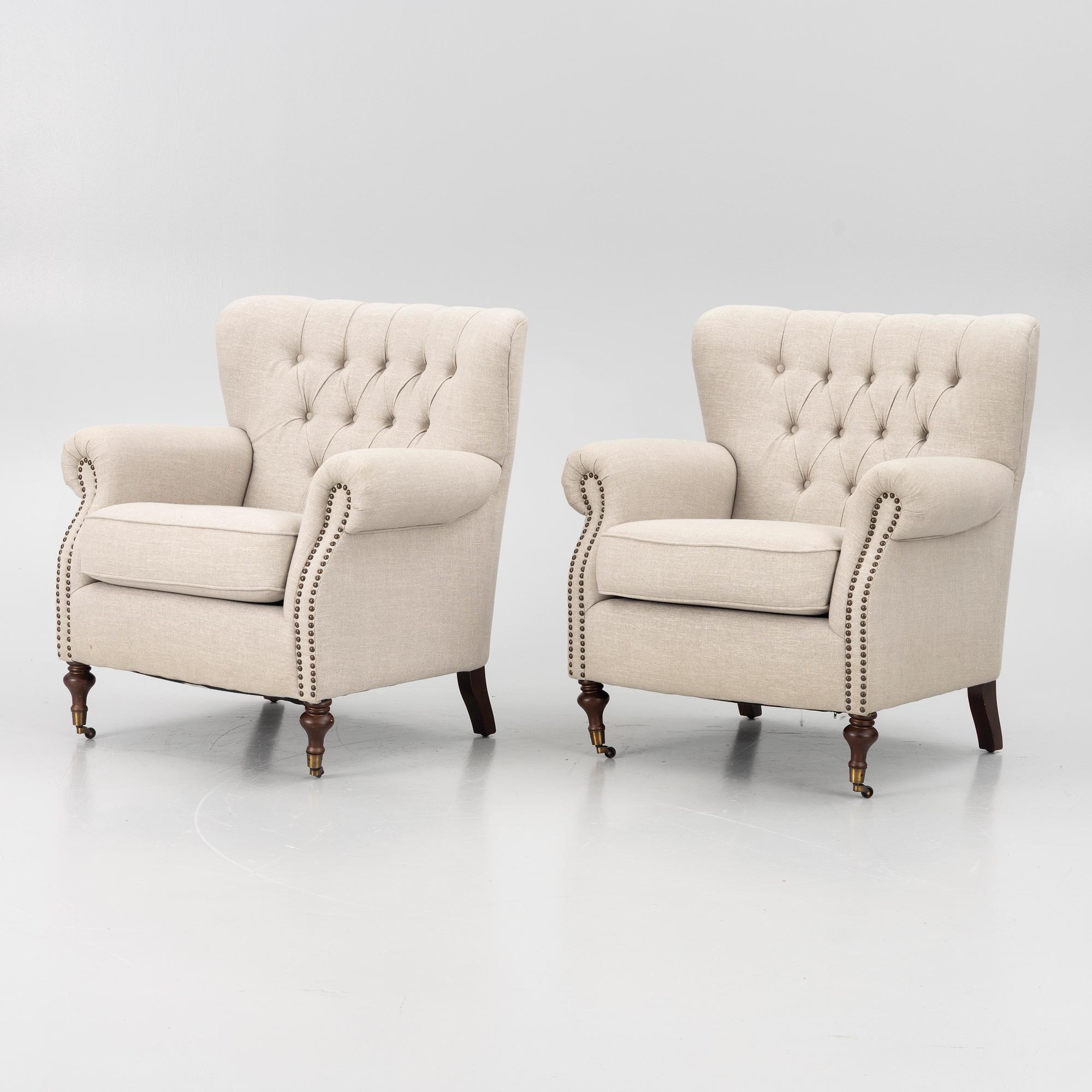A pair of armchairs, early 21st century.