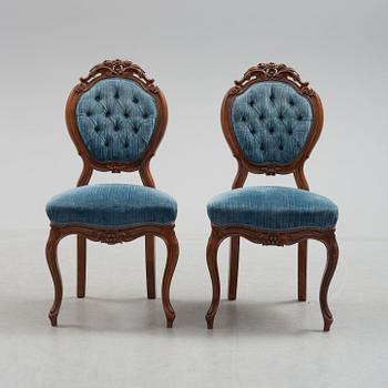 Six late 19th century walnut chairs.