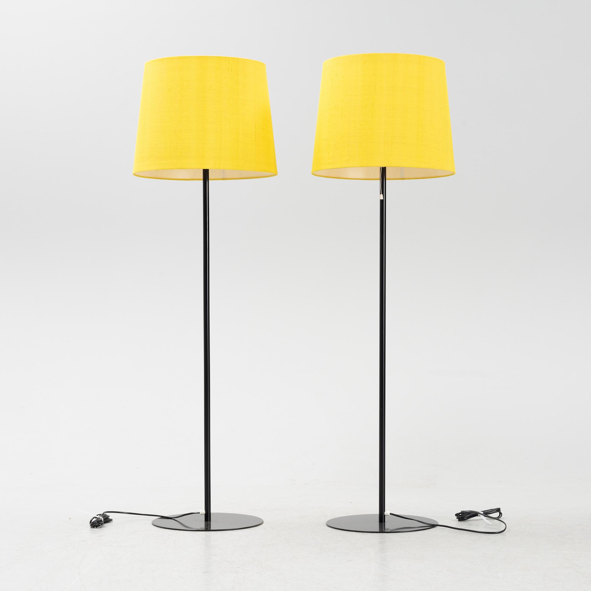 A pair of black metal floorlights, Luxus, Vittsjö.