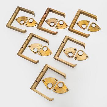 Dörrhandtag, 6 par, modell 75, tillverkare Mariefors Bruk. Modellen formgiven 1952.