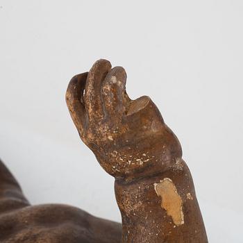 A wooden sculpture, putto with a pope's hat, South Europe, probably 18th Century.