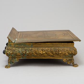 BOKSTÄLL, mässing, 1800-talets andra hälft.