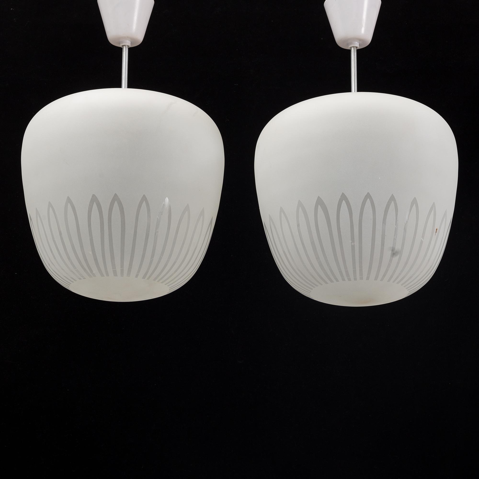 A pair of 1940's Swedish medern ceiling lamps.