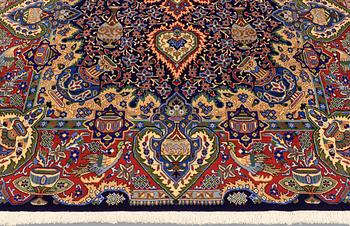 A carpet, Figural Kashmar, ca 315 x 203 cm.