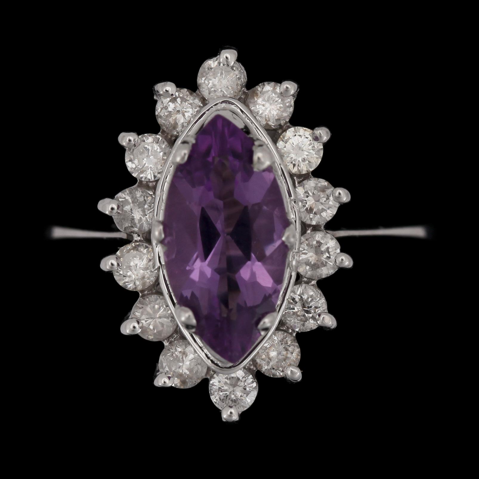 RING, 14k vitguld med navettslipad ametist ca1,65ct och briljantslipade diamanter tot ca0,42ct. 2000-tal. Vikt 3,1g.